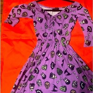 Pinup contoured pinup girl clothing. Deadly dames rare dress.